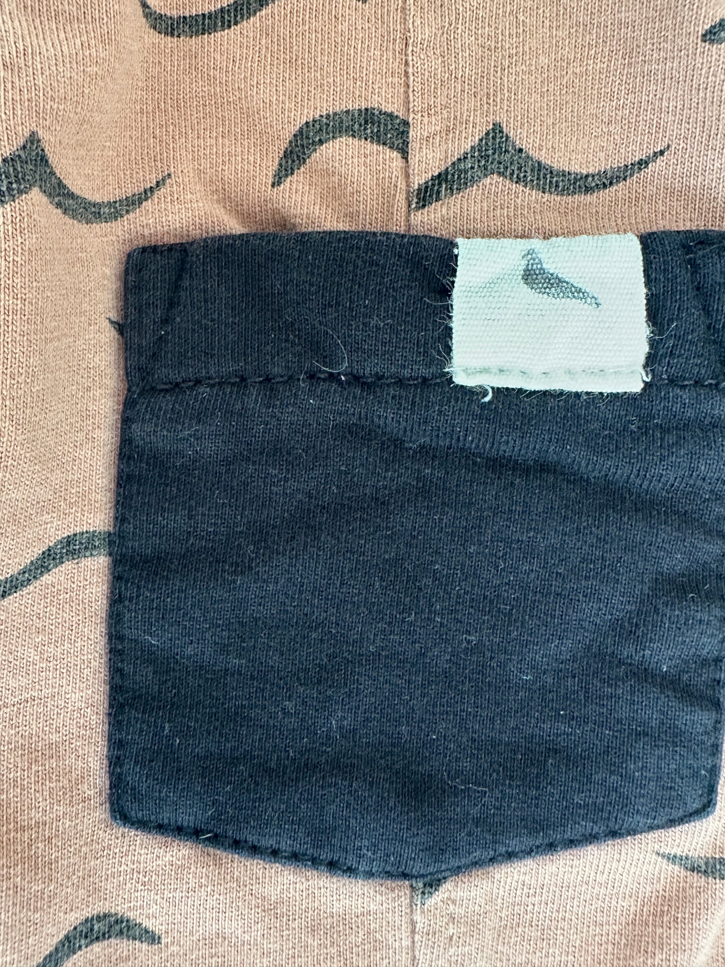 Romper by Turtledove London- Size 6-months